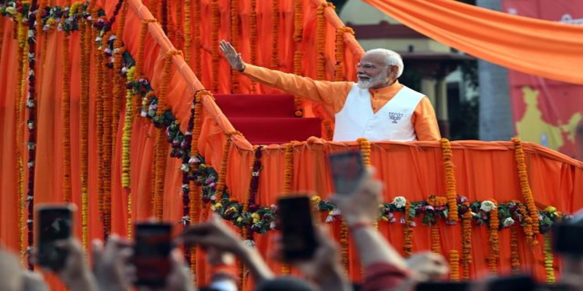 Modi celebrates victory in India vote, but falls short of landslide