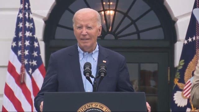 'I'm not going anywhere,' Biden tells crowd
